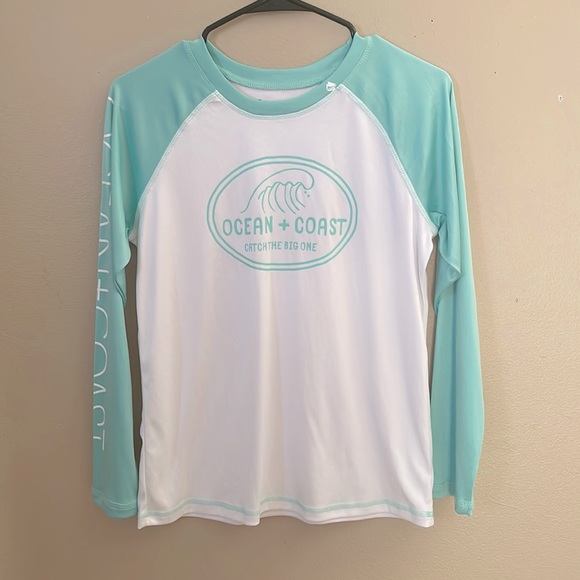 β’π½ππΎπ πΎπ²π΄π°π½ π²πΎπ°ππ ππ·πΈππ - Picture 1 of 6